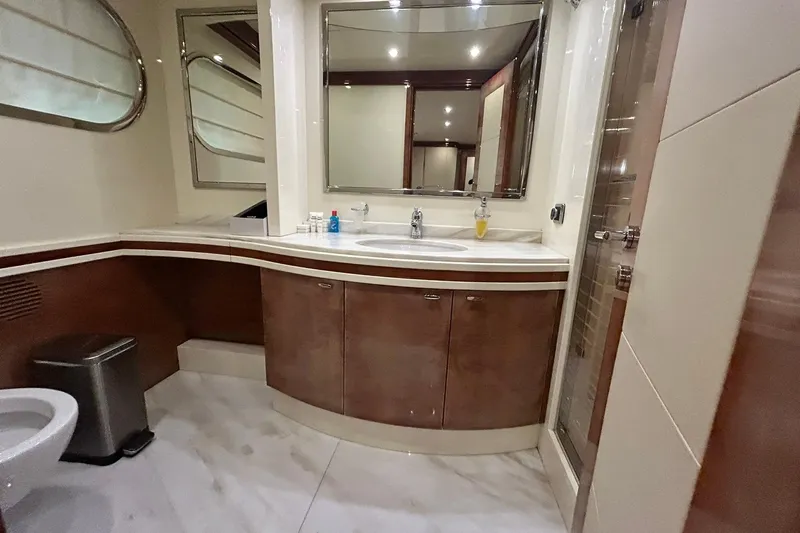 Sunshine Yacht Photos Pics Luxurious bathroom in 2010 Versilcraft Euroyacht Planet 125S Hardtop with modern fixtures and elegant design.