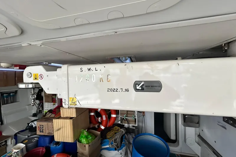 Sunshine Yacht Photos Pics Interior of 2010 Versilcraft Euroyacht Planet 125S with equipment and storage items.