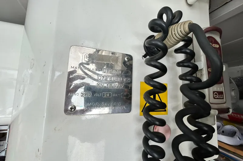 Sunshine Yacht Photos Pics Close-up of a Versilcraft Euroyacht Planet 125S Hardtop 2010 model identification plate.