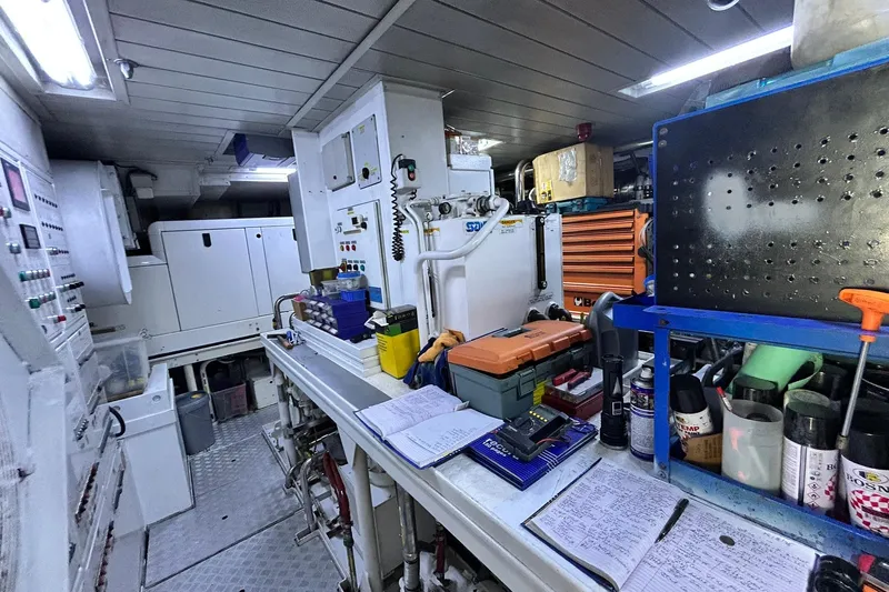 Sunshine Yacht Photos Pics Engine room of 2010 Versilcraft Euroyacht Planet 125S, featuring tools and equipment.
