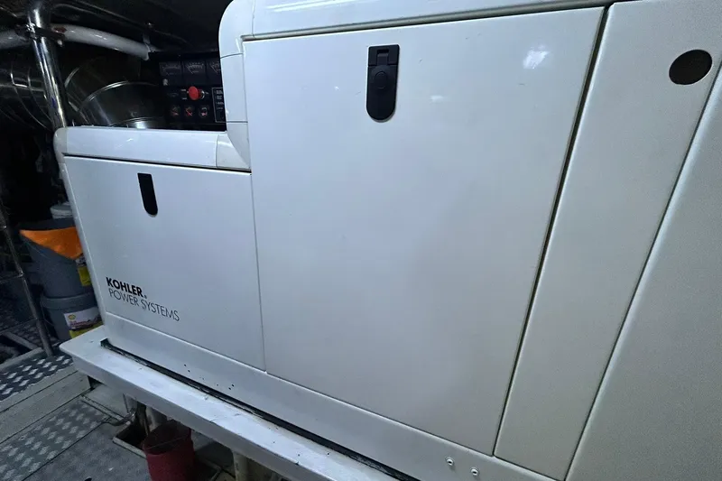 Sunshine Yacht Photos Pics Kohler Power Systems generator inside 2010 Versilcraft Euroyacht Planet 125S Hardtop.