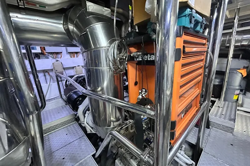 Sunshine Yacht Photos Pics Engine room of 2010 Versilcraft Euroyacht Planet 125S Hardtop with tools and machinery.