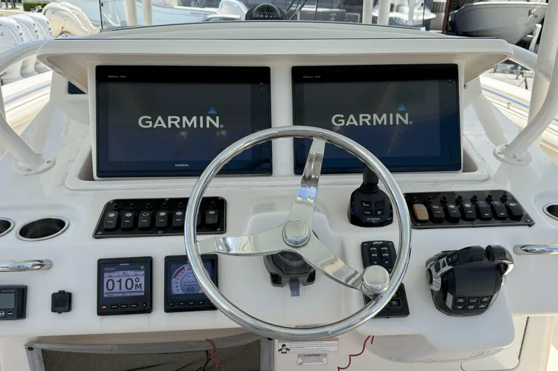 336-311 Brokerage Ron Yacht Photos Pics 2018 Grady-White Canyon 336 helm with Garmin displays and controls.