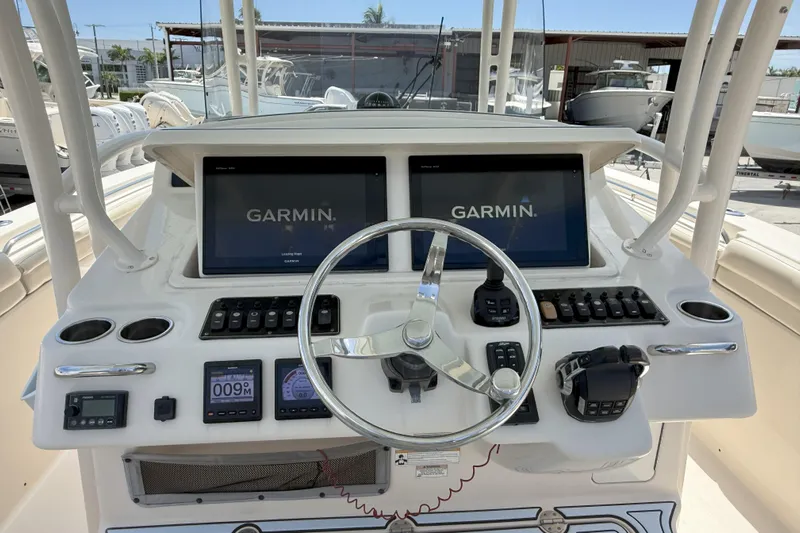 336-311 Brokerage Ron Yacht Photos Pics 2018 Grady-White Canyon 336 helm with dual Garmin displays and control panel.