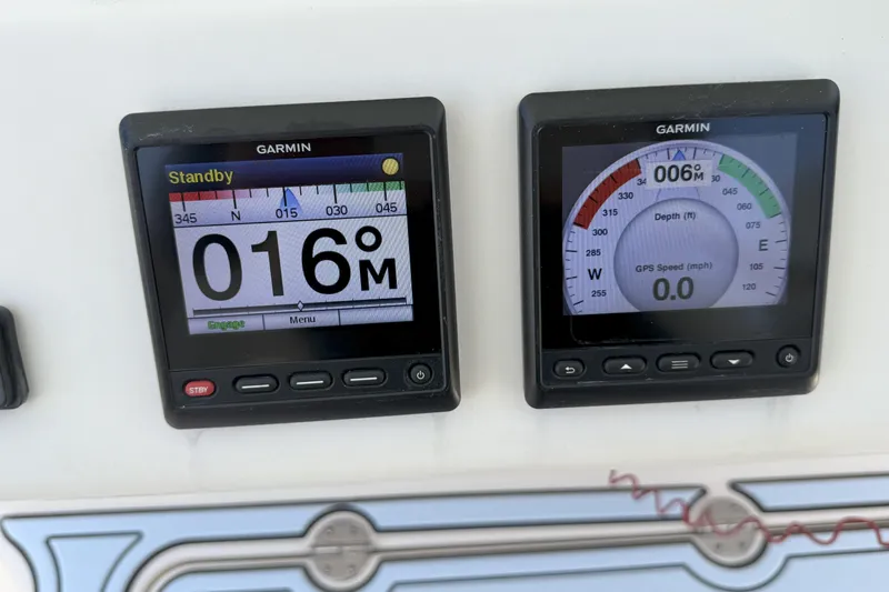 336-311 Brokerage Ron Yacht Photos Pics Garmin navigation displays on 2018 Grady-White Canyon 336 boat dashboard.