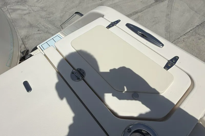 336-311 Brokerage Ron Yacht Photos Pics 2018 Grady-White Canyon 336 boat deck with shadow and hatch detail.