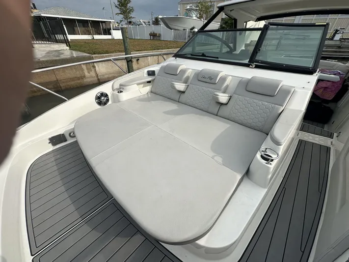  Yacht Photos Pics 2021 Sea Ray Sundancer 320 OB boat with spacious rear seating and modern design.