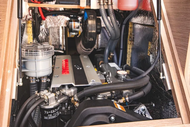 Yacht Photos Pics Engine compartment of 2022 Hanse 458 yacht, showcasing detailed mechanical components.