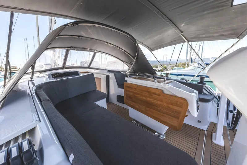  Yacht Photos Pics Luxurious 2022 Hanse 458 yacht interior with sleek seating and modern design.