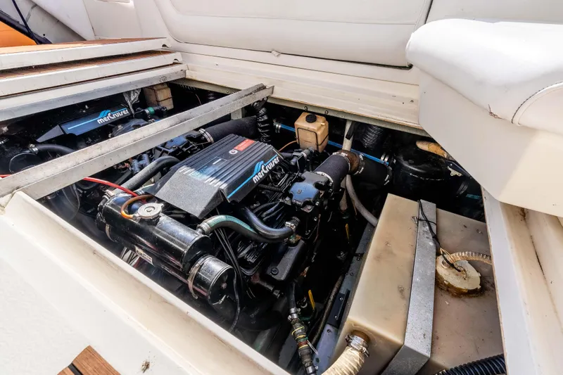 Sea Oddity Yacht Photos Pics Engine compartment of a 1991 Sea Ray 330 Sundancer with MerCruiser components.