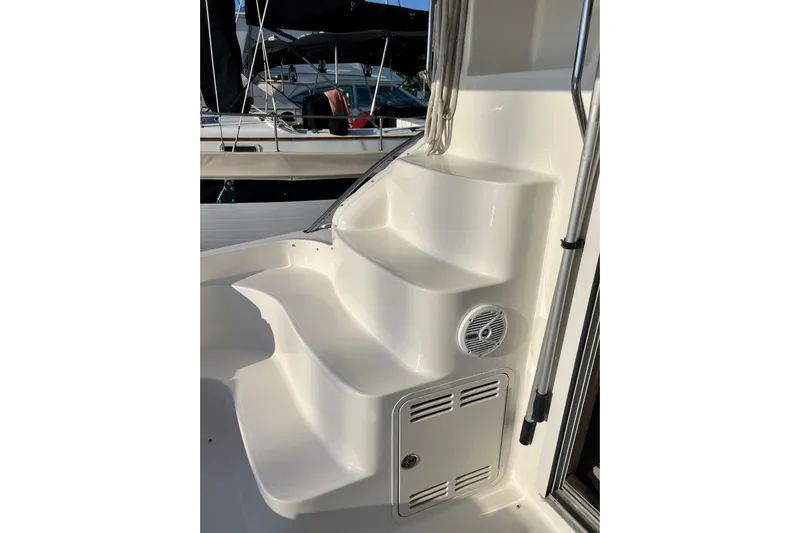Get Nuts Yacht Photos Pics Staircase on a 2000 Sea Ray 400 Sedan Bridge yacht, featuring sleek white design.