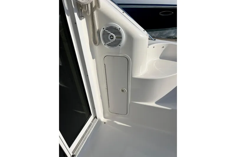 Get Nuts Yacht Photos Pics 2000 Sea Ray 400 Sedan Bridge boat interior with speaker and storage compartment.