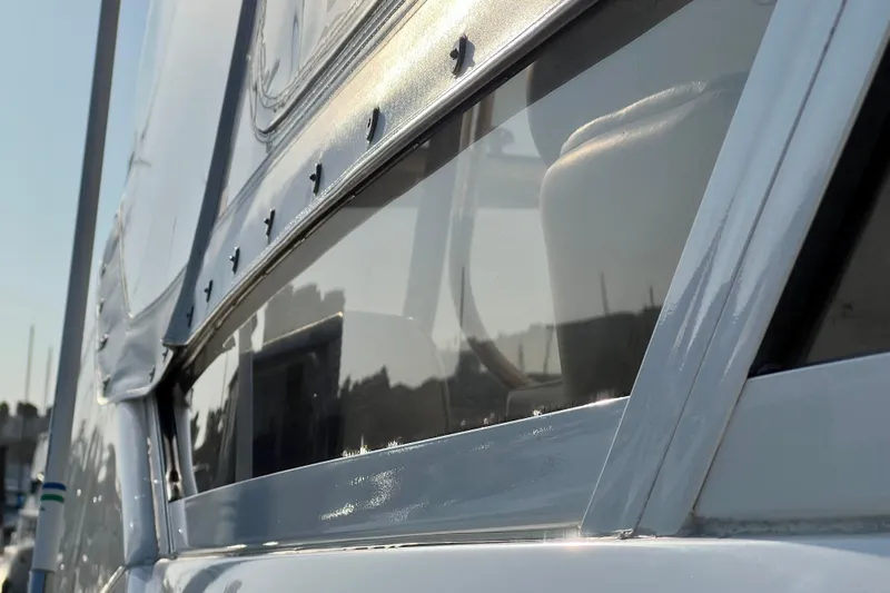 Get Nuts Yacht Photos Pics Close-up of 2000 Sea Ray 400 Sedan Bridge yacht window detail.