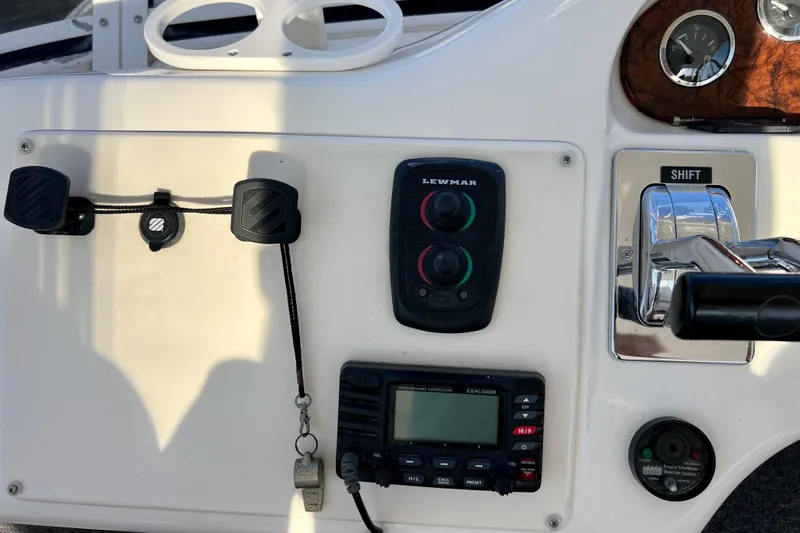 Get Nuts Yacht Photos Pics Control panel of a 2000 Sea Ray 400 Sedan Bridge boat with navigation equipment.