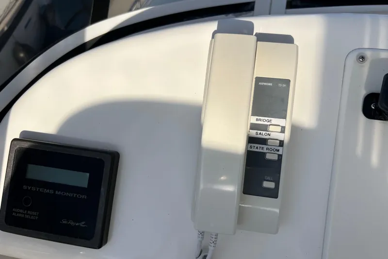 Get Nuts Yacht Photos Pics Intercom and systems monitor on 2000 Sea Ray 400 Sedan Bridge yacht.