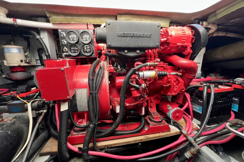 Get Nuts Yacht Photos Pics Engine room of a 2000 Sea Ray 400 Sedan Bridge with a Westerbeke generator.
