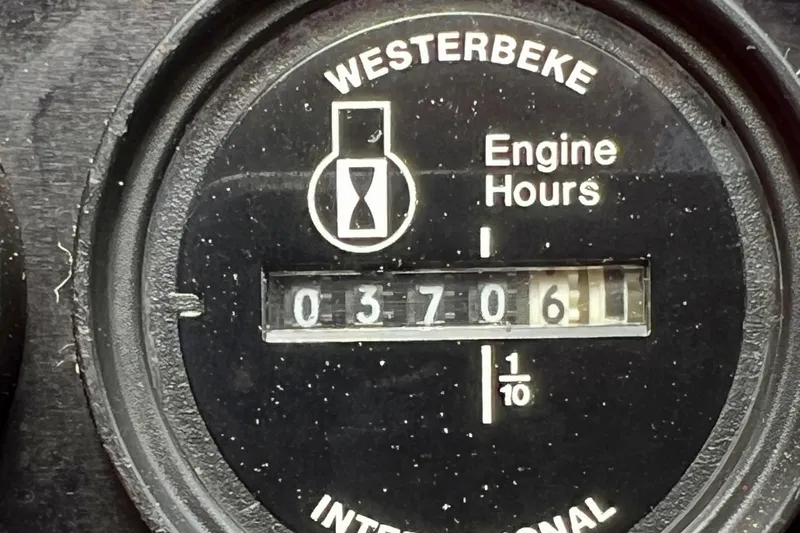 Get Nuts Yacht Photos Pics Westerbeke engine hour meter showing 3706.1 hours on a 2000 Sea Ray 400 Sedan Bridge.