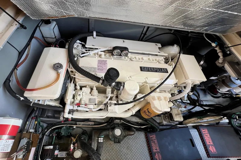 Get Nuts Yacht Photos Pics Engine room of 2000 Sea Ray 400 Sedan Bridge with Caterpillar engine.