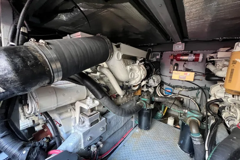 Get Nuts Yacht Photos Pics Engine room of a 2000 Sea Ray 400 Sedan Bridge with visible components and wiring.