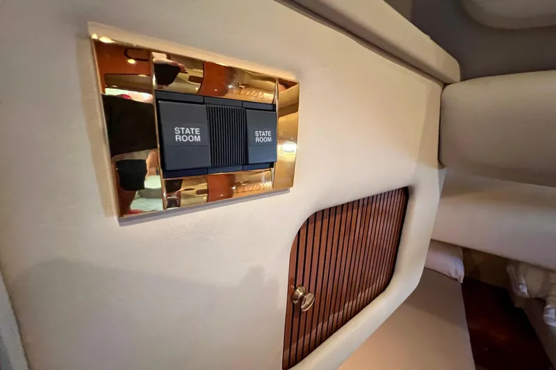 Get Nuts Yacht Photos Pics Luxury interior of 2000 Sea Ray 400 Sedan Bridge, featuring stateroom controls.