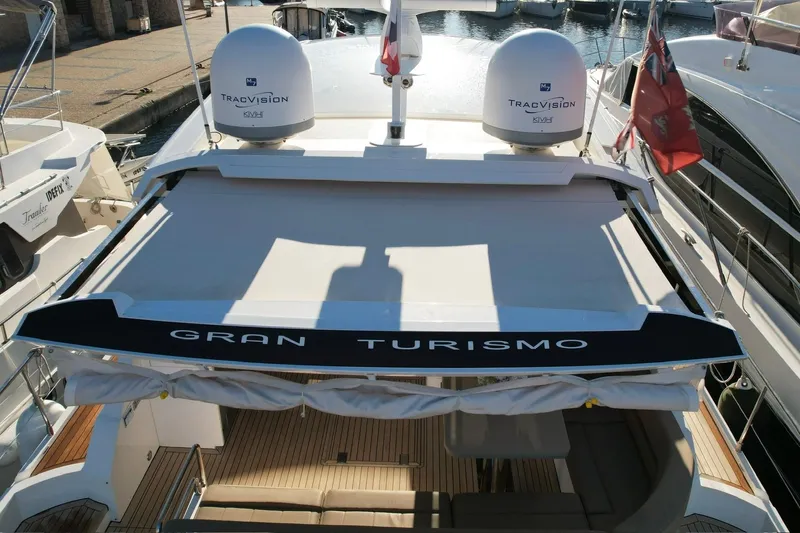  Yacht Photos Pics 2013 Fairline Targa 62 GT yacht with "Gran Turismo" branding at a marina.