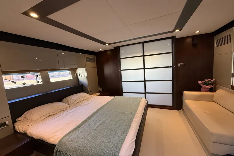  Yacht Photos Pics Luxurious bedroom interior of 2013 Fairline Targa 62 GT yacht with modern design.