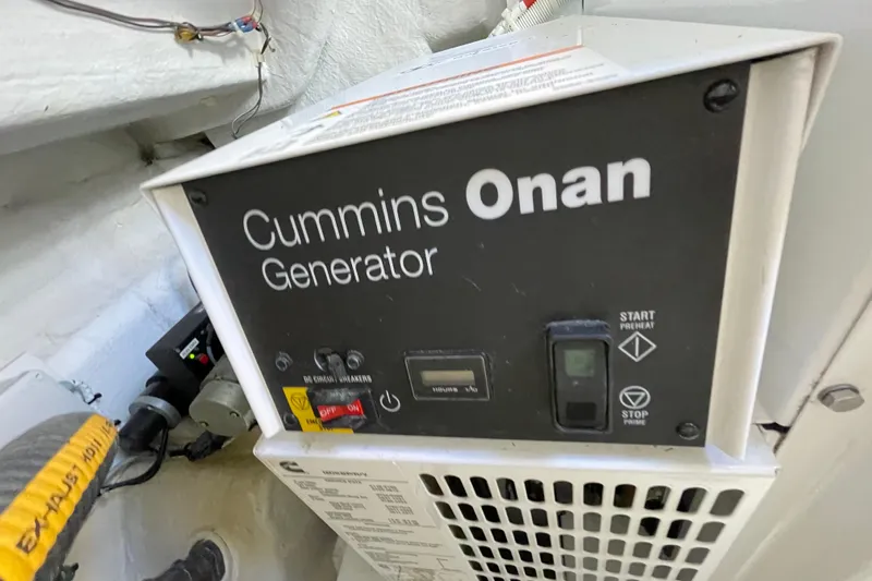  Yacht Photos Pics Cummins Onan generator in 2013 Fairline Targa 62 GT yacht engine room.