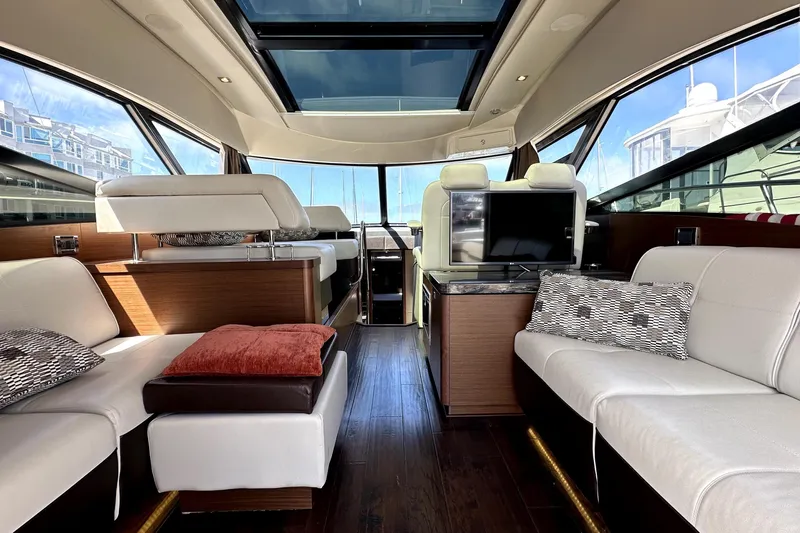 Baby Pie Yacht Photos Pics Luxurious interior of 2016 Sea Ray 470 Sundancer yacht with plush seating and modern amenities.