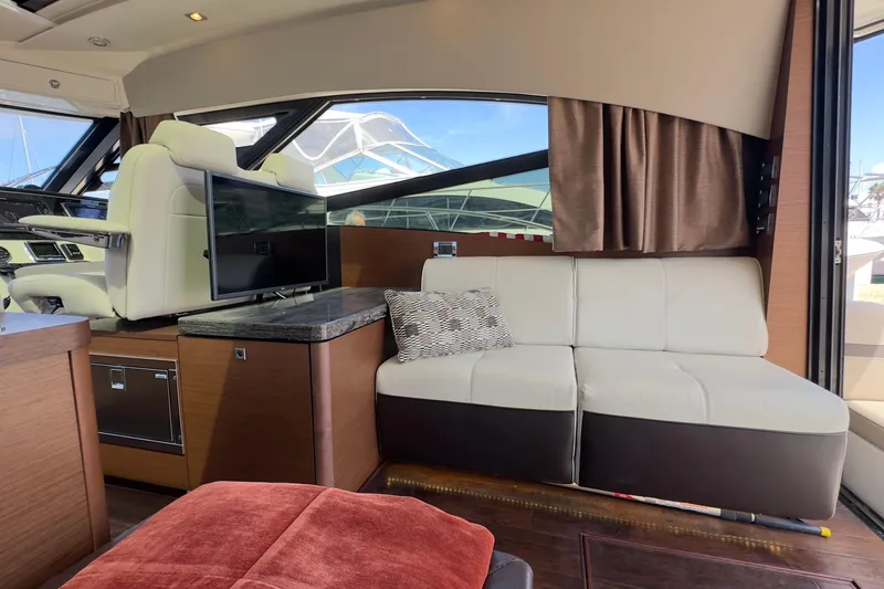 Baby Pie Yacht Photos Pics Luxurious interior of 2016 Sea Ray 470 Sundancer yacht with plush seating and modern design.