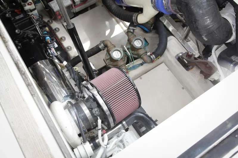 Baby Pie Yacht Photos Pics Engine compartment of 2016 Sea Ray 470 Sundancer with visible air filter and components.