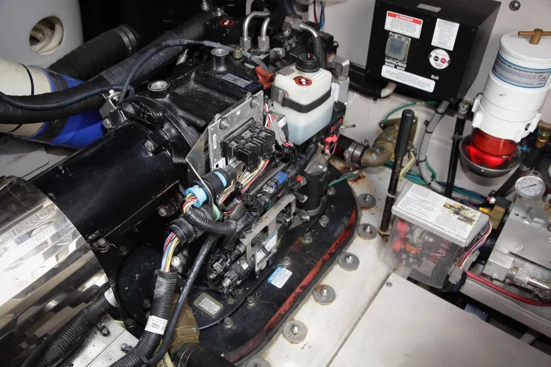 Baby Pie Yacht Photos Pics Engine room of 2016 Sea Ray 470 Sundancer with visible wiring and components.