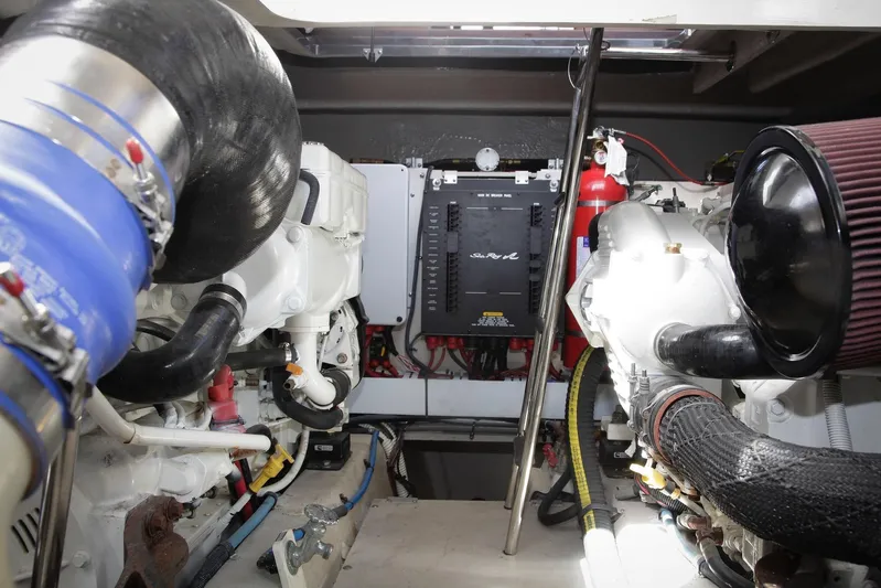 Baby Pie Yacht Photos Pics Engine room of 2016 Sea Ray 470 Sundancer yacht, showcasing mechanical components and systems.