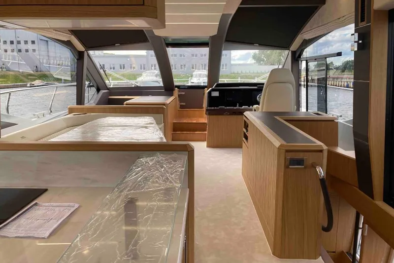  Yacht Photos Pics Luxurious interior of 2023 Galeon 640 Fly yacht with modern design and spacious layout.