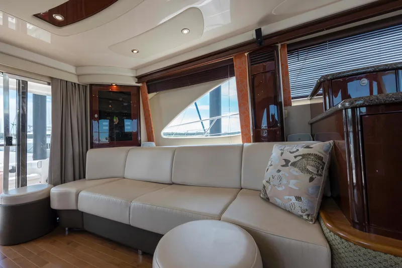  Yacht Photos Pics Luxurious interior of 2008 Sea Ray 58 Sedan Bridge yacht with elegant seating.
