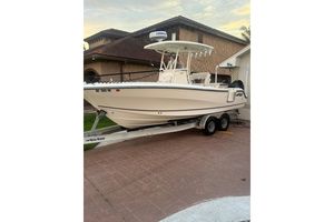 2020 Mako 235 boat on trailer in residential driveway.