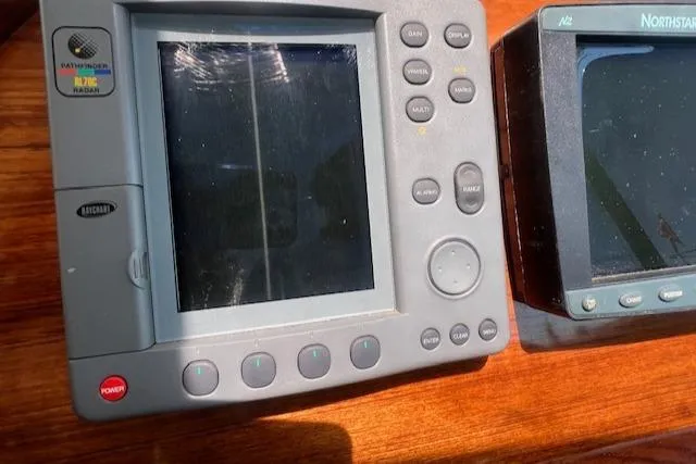 Free Will Yacht Photos Pics Navigation equipment on a 2003 Hinckley Extended Hardtop Pilothouse 36 Picnic Boat.