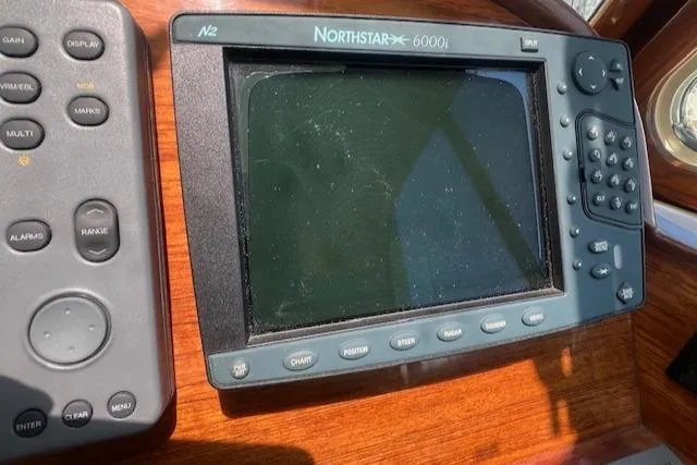 Free Will Yacht Photos Pics Navigation system on 2003 Hinckley Extended Hardtop Pilothouse 36 Picnic Boat dashboard.