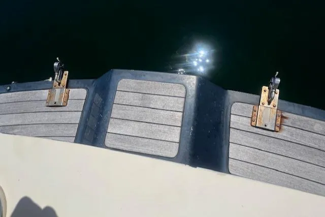 Free Will Yacht Photos Pics 2003 Hinckley Extended Hardtop Pilothouse 36 Picnic Boat deck with sunlight reflections.