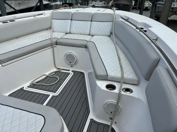 328 Sea Fox Commander Yacht Photos Pics 2020 Sea Fox Commander 328 boat interior with cushioned seating and marine speakers.