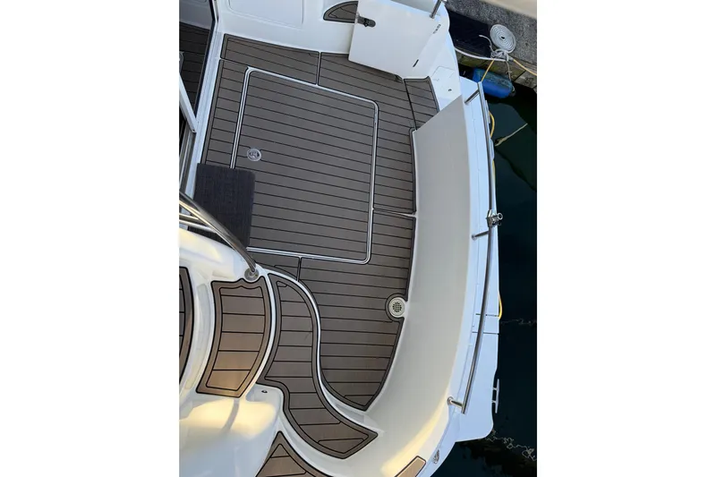  Yacht Photos Pics 2007 Meridian 341 Sedan boat deck with wood finish and sleek design.