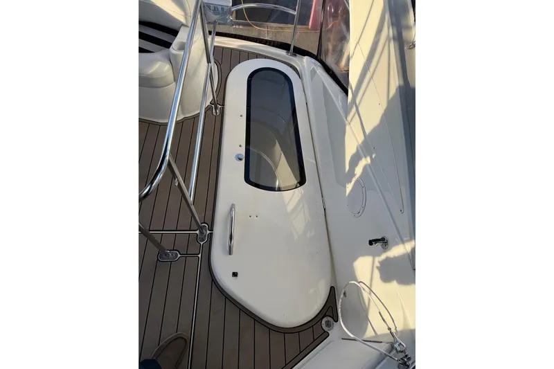  Yacht Photos Pics 2007 Meridian 341 Sedan yacht deck with sleek design and stainless steel railings.