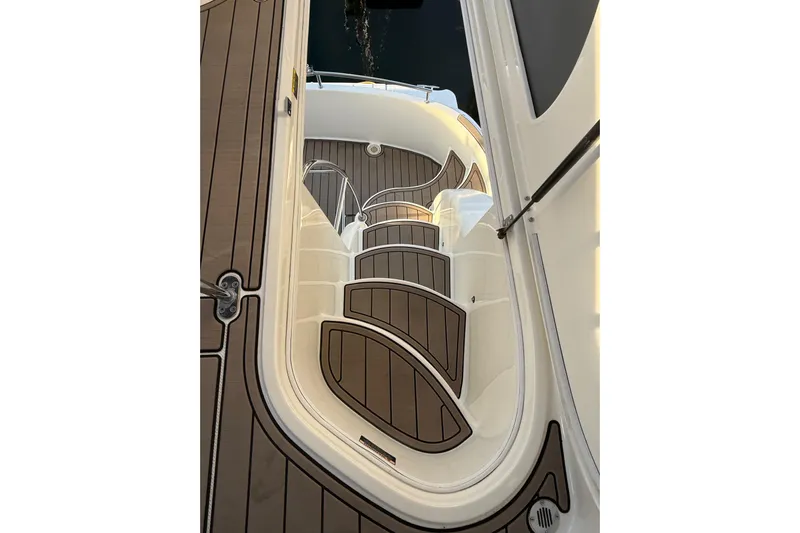  Yacht Photos Pics 2007 Meridian 341 Sedan boat interior with elegant wooden steps and sleek design.