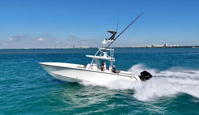  Yacht Photos Pics 2017 SeaVee 390Z boat cruising on clear blue ocean waters.