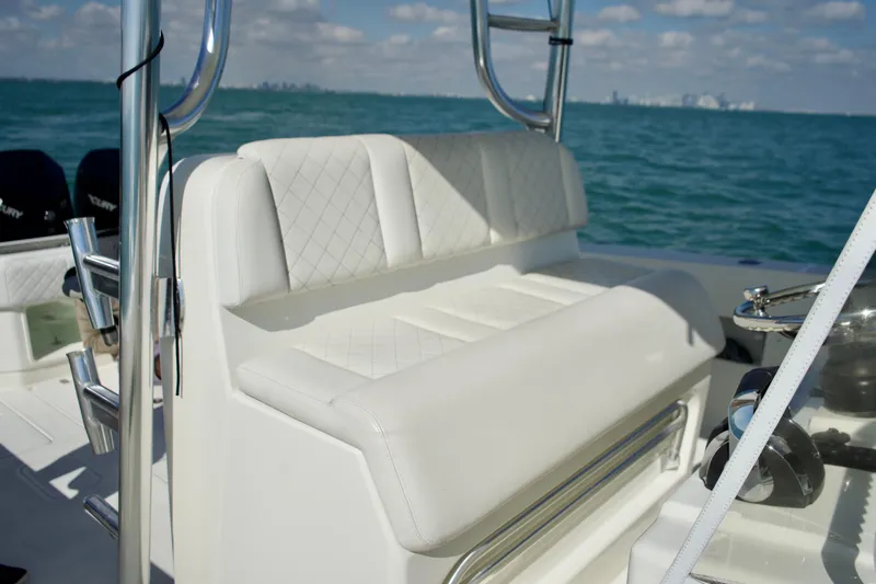  Yacht Photos Pics 2017 SeaVee 390Z boat with white seating, ocean backdrop, and clear sky.