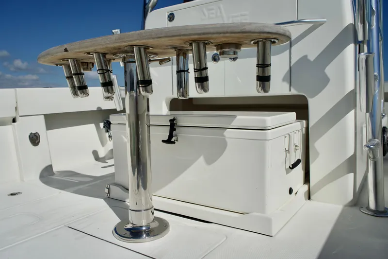  Yacht Photos Pics 2017 SeaVee 390Z boat deck with rod holders and storage box.