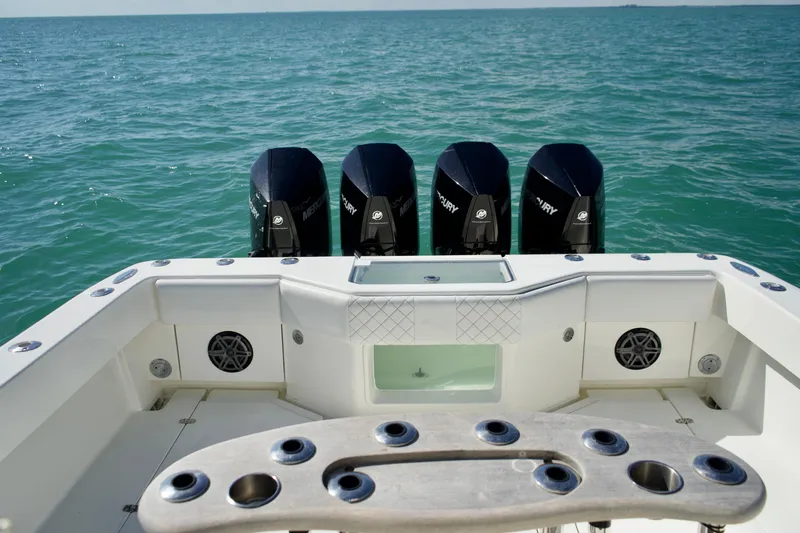  Yacht Photos Pics 2017 SeaVee 390Z boat with four powerful outboard engines on open water.