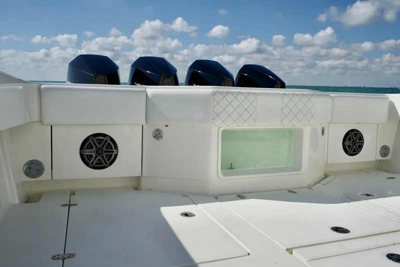  Yacht Photos Pics 2017 SeaVee 390Z boat deck with four engines and ocean backdrop.