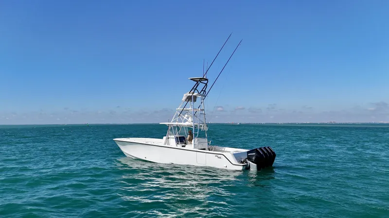  Yacht Photos Pics 2017 SeaVee 390Z boat on open water under clear blue sky.