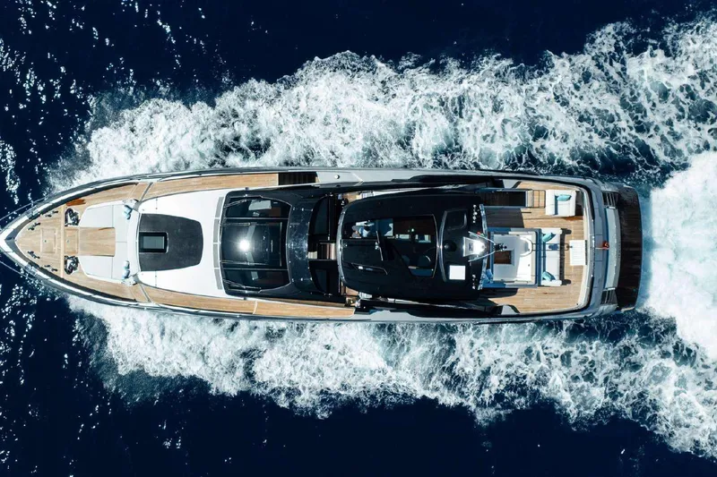 Clarity Yacht Photos Pics Aerial view of 2022 Riva 90' Argo yacht cruising on the ocean.
