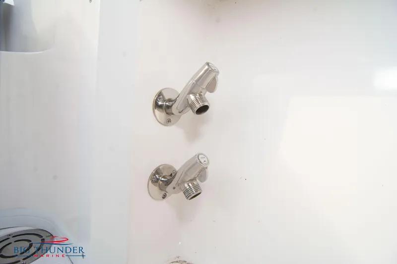  Yacht Photos Pics Stainless steel fixtures on 2023 Fountain 34 CC boat interior.